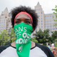 An abortion-rights activist listens to speakers before a march to the White House to denounce the U.S. Supreme Court decision to end federal abortion rights protections. The Court's decision in Dobbs v Jackson Women's Health